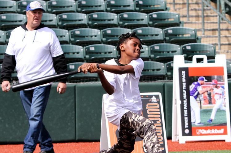 Fungo Coach behind home plate at the BGC Quickball Tournament